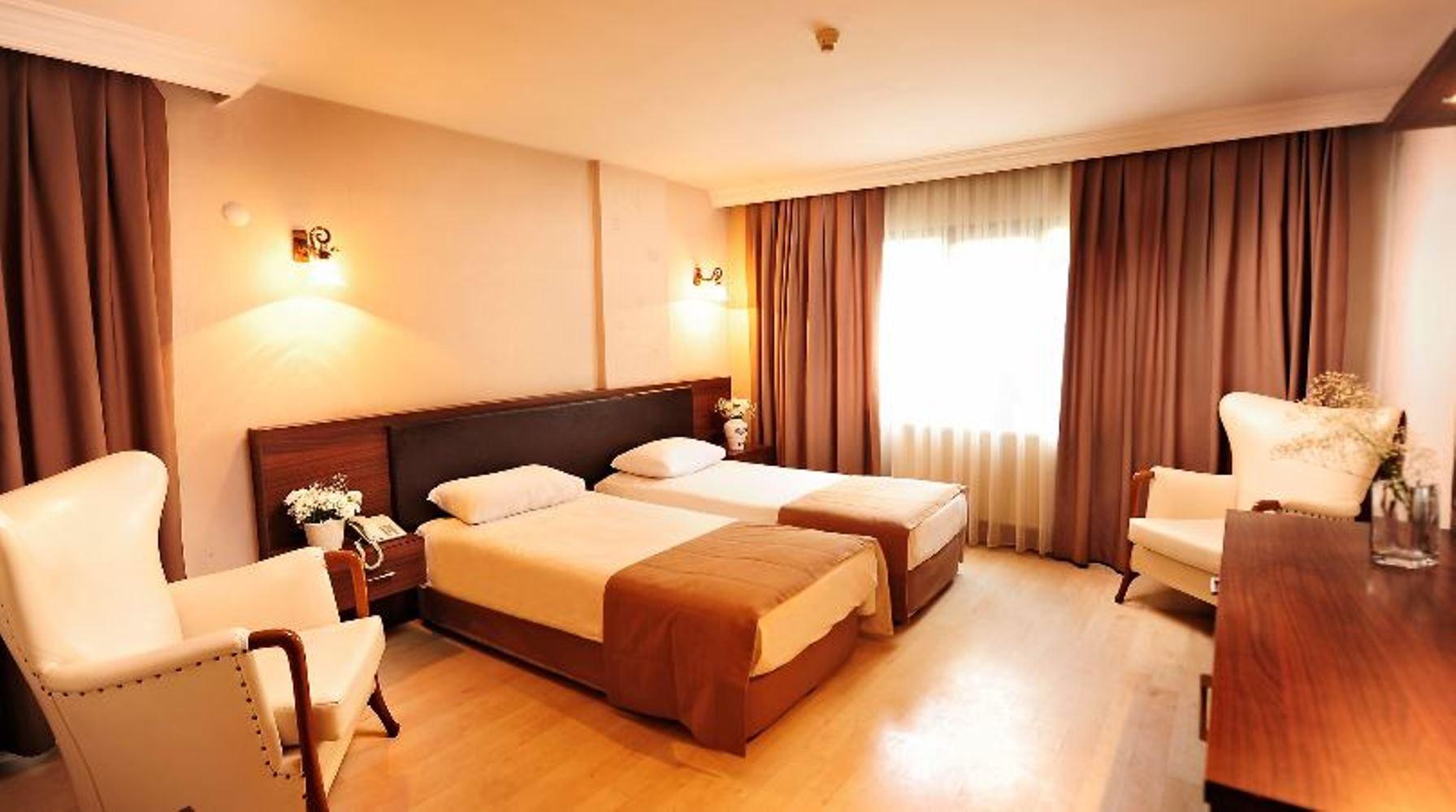 Uestuen Hotel Alsancak Измир Экстерьер фото