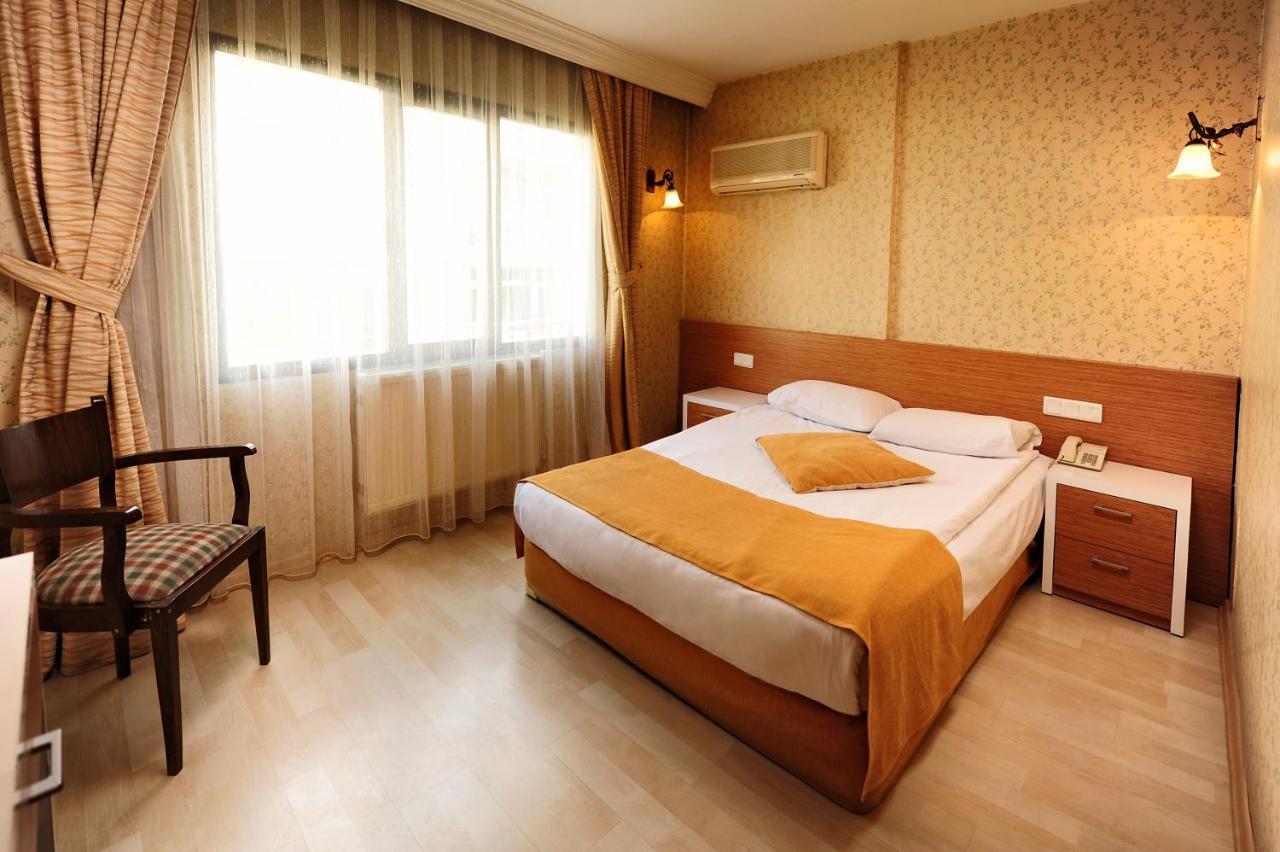 Uestuen Hotel Alsancak Измир Экстерьер фото