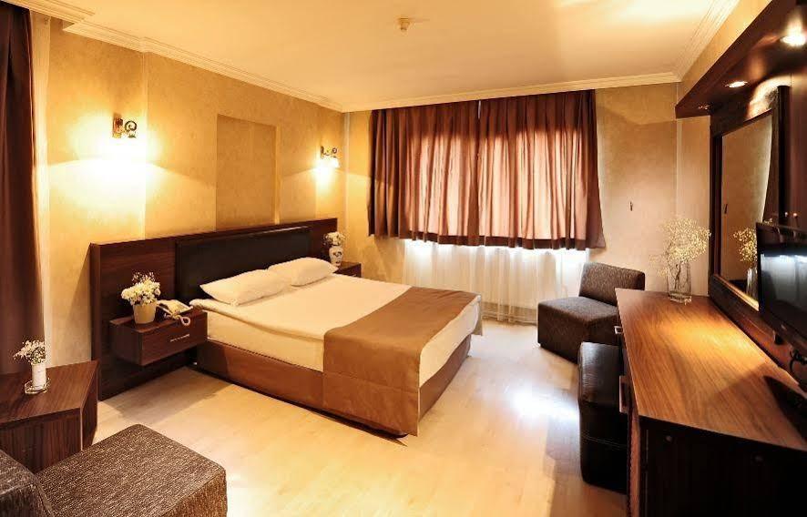Uestuen Hotel Alsancak Измир Экстерьер фото